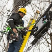 bell canada technician installing new fibre to home customer's line